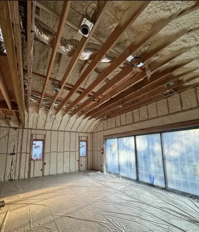 Interior walls and ceiling insulated with spray foam during new construction in Eden Prairie